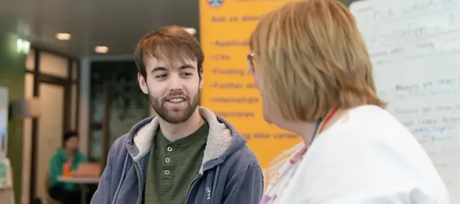Careers Adviser with student