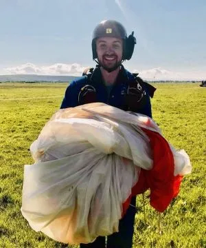 Ben Johnson standing in a field