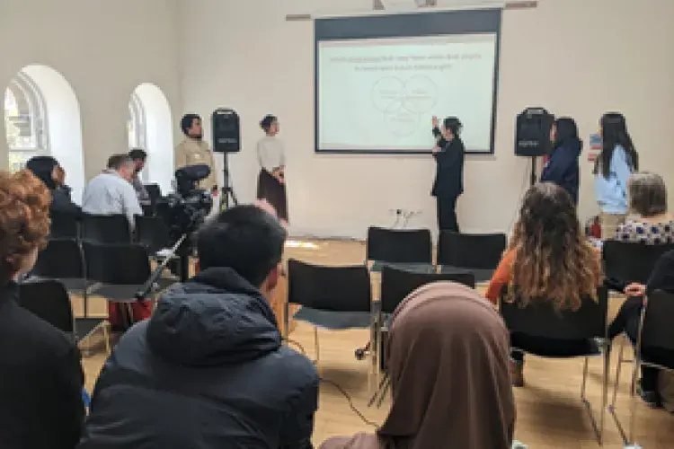 Students presenting their ideas to university staff and students at the final event.